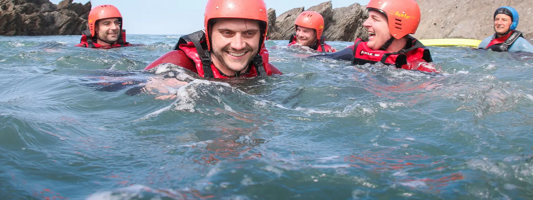 North Devon coasteering group in the sea